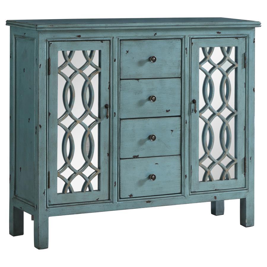This well-crafted wooden cabinet adds a splash of color and classic charm to any space. Finished in a distressed blue, it features four center drawers for organizing linens or silverware, while two side doors with mirrored insets and carved lattice detail