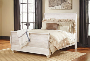 The ultimate look for a beach cottage or shabby chic inspired retreat, this queen sleigh bed carries you away to a dreamy time and place. Driftwoody whitewashed finish is wonderfully easy on the eyes. Faux plank detailing incorporates a classically rustic