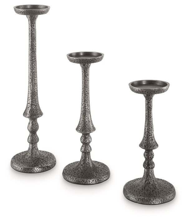 Is your ideal air of ambiance filled with antiqued flair? We invite you to tap into the plentiful possibilities of these candle holders. Scatter the set across shelves in your in-home library or office as a moody backdrop for your next illuminating idea. 