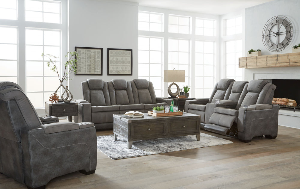 This sleek, ultra-modern power reclining collection has it all. With designer looks and head-to-toe comfort, it has the upscale look of leather at a scaled-down faux leather price. Its gray two-tone upholstery is more durable and water-repellent than regu