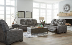 This sleek, ultra-modern power reclining collection has it all. With designer looks and head-to-toe comfort, it has the upscale look of leather at a scaled-down faux leather price. Its gray two-tone upholstery is more durable and water-repellent than regu