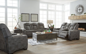 This sleek, ultra-modern power reclining collection has it all. With designer looks and head-to-toe comfort, it has the upscale look of leather at a scaled-down faux leather price. Its gray two-tone upholstery is more durable and water-repellent than regu