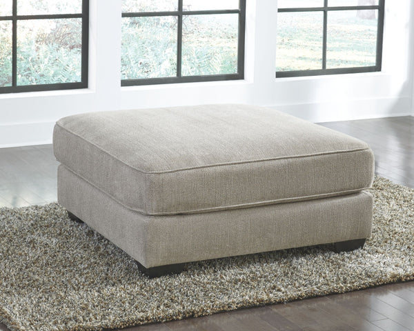  this oversized accent ottoman is worthy of taking center stage. Its textural chenille upholstery is pure delight