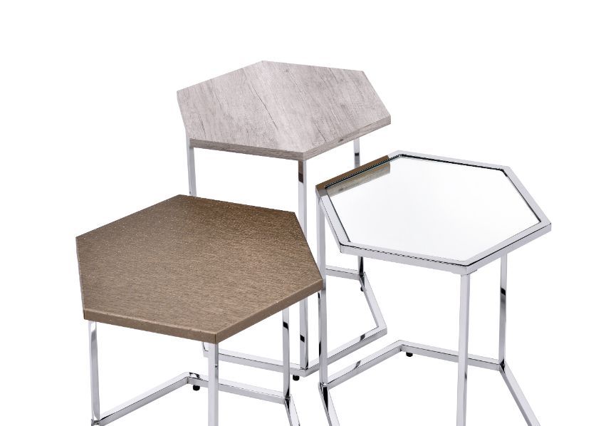Non-traditional geometric designs add fabulous accents to your living room. This lovely nesting table set features six-sided table tops that offer a fantastic honeycomb geometric flair in your room decor. Metal table frame showcases a clean-lined silhouet