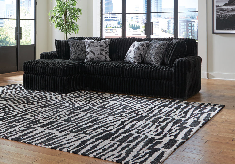 Wrapped in luxuriously soft jumbo corduroy, this sectional sofa with chaise takes cozy and inviting to a higher level. The sumptuous piece is perfect for unwinding after a long day, with exceptionally textured cushions that deliver pure indulgence. Now al