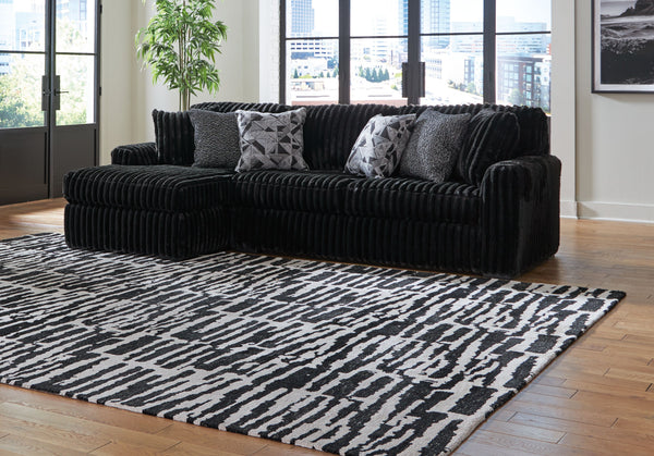  this sectional sofa with chaise takes cozy and inviting to a higher level. The sumptuous piece is perfect for unwinding after a long day