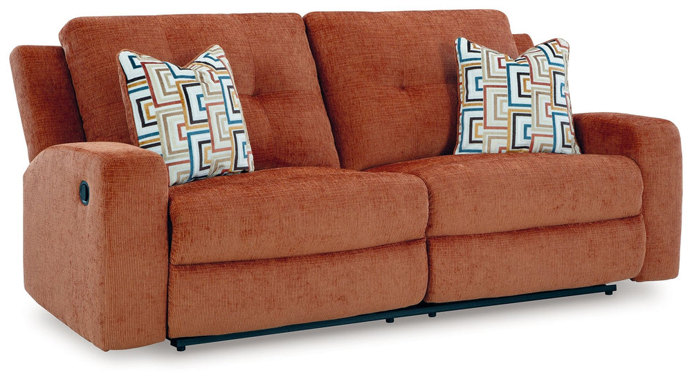 This reclining sofa invites you to a luxuriously soft lounging experience. The chic hue fits right in with contemporary color palettes. A tufted back keeps the look right on trend. Balancing style and function, its pull tab reclining effortlessly takes yo