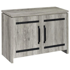 This storage cabinet features a clean-lined silhouette with industrial-inspired hardware for a functional, modern-rustic look. Crafted from engineered wood with a scratch-resistant and eco-friendly laminate veneer, it showcases a grey driftwood finish tha