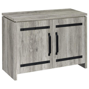 This storage cabinet features a clean-lined silhouette with industrial-inspired hardware for a functional, modern-rustic look. Crafted from engineered wood with a scratch-resistant and eco-friendly laminate veneer, it showcases a grey driftwood finish tha