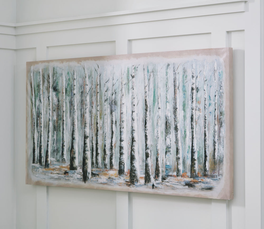 Bring the beauty of nature indoors with this wall art. Its shades and shadows invite you into the treescape, with hand-painted embellishments adding stunning detail. Hang this statement piece in the living room or a home office to incorporate a tranquil t