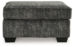  the plush upholstery and dark tri-block legs are a natural complement for so many color