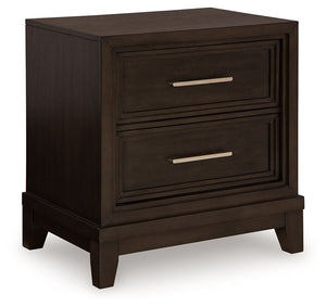 This nightstand combines modern and art deco styles for both traditional and contemporary arrangements. With elegant stepped moulded framing and two spacious drawers, it adds dimension to your sanctuary while keeping your belongings organized and clutter-