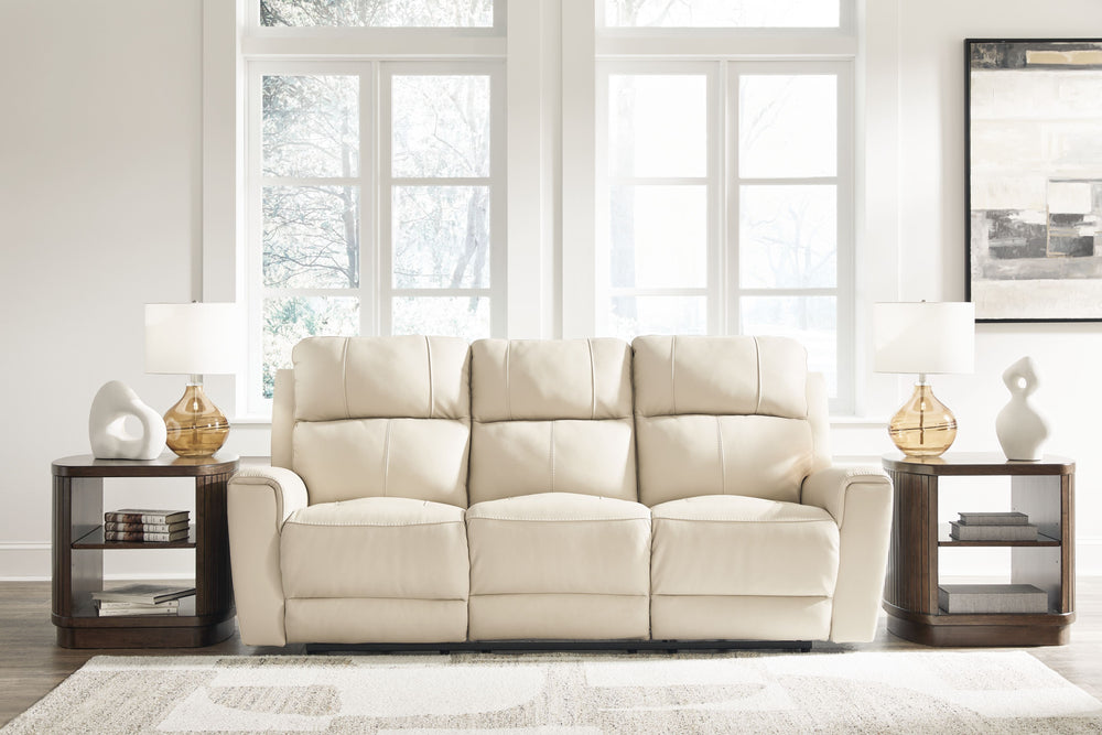 Focus on function. This practical power reclining sofa balances contemporary character and irresistible comfort. Its affordable, expertly matched leather and faux leather upholstery keeps your style up to speed without breaking the bank. Reclining at the 