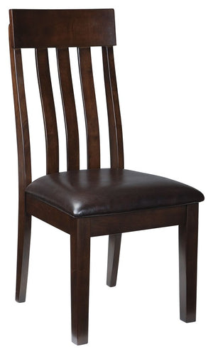 Take clean-lined, classic styling. Add modern comfort. Top with a deep, complex finish that exudes rich sophistication. Thatâ€™s the look and feel of this dining room chair. Wide-slat, rake-back design with lumbar curve and cushioned upholstered seat make