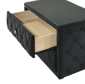  while the crystal-like drawer pulls add a touch of glamour. The sleek glass top e