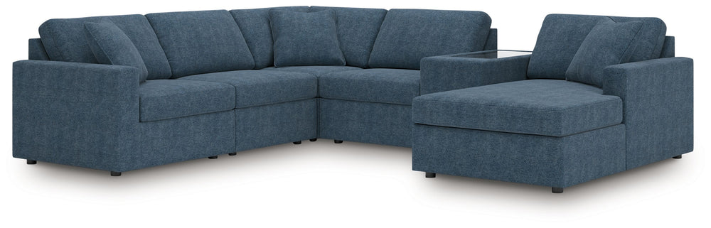 Looking cool and contemporary is great. But when it comes down to it, youâ€™re all about low-maintenance lounging. With the performance fabric on this sectional with console, cleaning spills is a breeze. Its customizable modular design caters to your ever