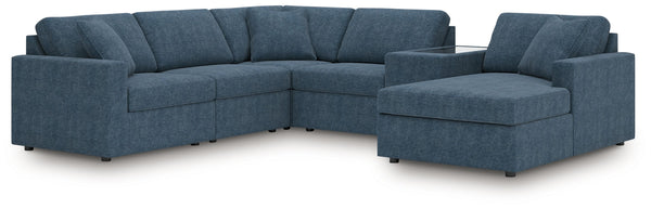 Looking cool and contemporary is great. But when it comes down to it, youâ€™re all about low-maintenance lounging. With the performance fabric on this sectional with console, cleaning spills is a breeze. Its customizable modular design caters to your ever