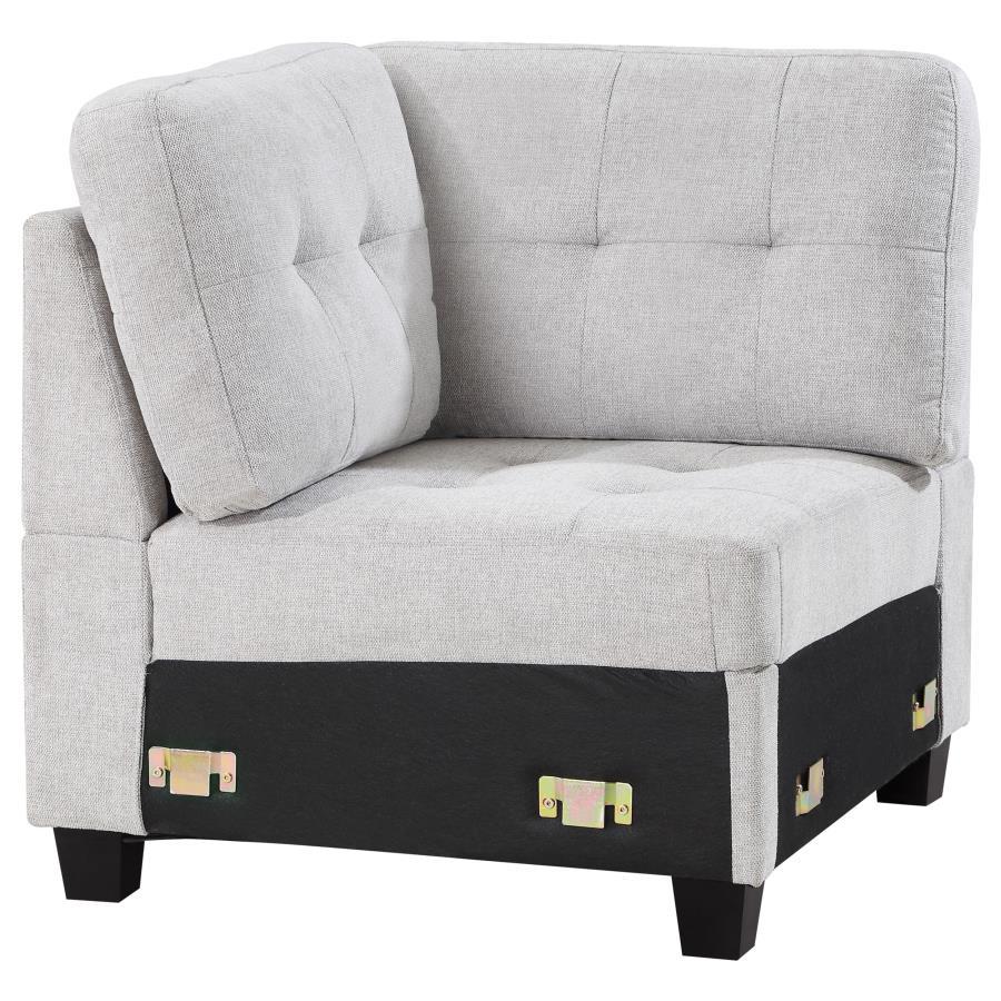 Customize a sectional that suits your space with a modern armless corner chair. In soft beige upholstery, it-'s the perfect centerpiece for your Georgina collection sectional sofa, creating a turn just where you need it to suit your living room. The corne