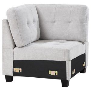 Customize a sectional that suits your space with a modern armless corner chair. In soft beige upholstery, it-'s the perfect centerpiece for your Georgina collection sectional sofa, creating a turn just where you need it to suit your living room. The corne