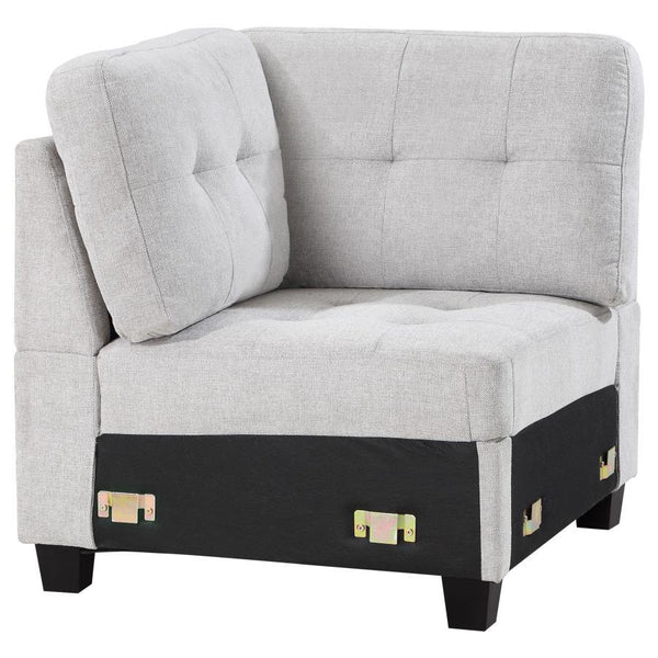 Customize a sectional that suits your space with a modern armless corner chair. In soft beige upholstery, it-'s the perfect centerpiece for your Georgina collection sectional sofa, creating a turn just where you need it to suit your living room. The corne