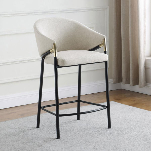  the legs come in a glossy black finish that lends to many color palettes and offers a handsome look. Each stool has a cushioned seat