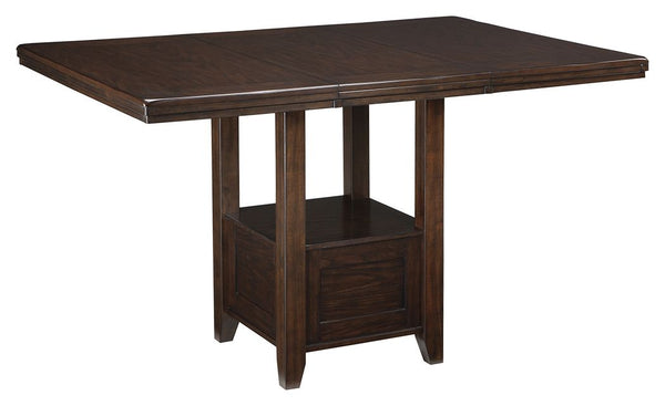 Modern sophistication, beautifully served. This counter height extension table raises the bar with a simply striking design and rich, dark finish. Removable leaf stretches the possibilities. Built-in shelf stacks up as additional storage space.<br><br><b>