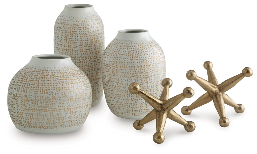 Elevate your decor with this striking accessory set. Its sleek white vases, adorned with delicate goldtone accents, are perfect for displaying your favorite faux blooms or standing alone as minimalist statements. They-'re paired with bold geometric sculpt