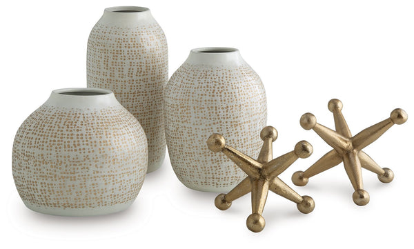 Elevate your decor with this striking accessory set. Its sleek white vases, adorned with delicate goldtone accents, are perfect for displaying your favorite faux blooms or standing alone as minimalist statements. They-'re paired with bold geometric sculpt