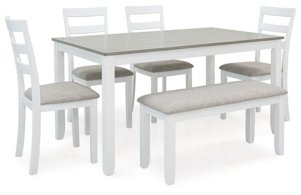 Feast your eyes on how beautiful simplicity can be. This dining set creates a cohesive, modern farmhouse feel with its clean-lined profile and chic two-tone color scheme. Its upholstered ladderback chairs are such a classic, while the addition of a comfor
