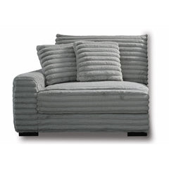 The Embrace Left Arm Facing Chair with 2 Accent Pillows in gray is a sophisticated and comfortable addition to your sectional arrangement. Featuring 100% gray polyester fabric with a fluffy, blanket-like texture, this chair promises ultimate relaxation. I