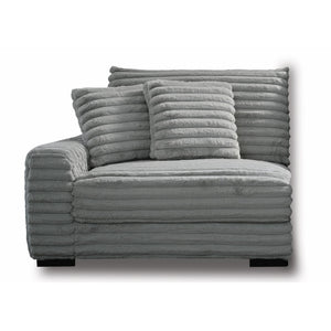 The Embrace Left Arm Facing Chair with 2 Accent Pillows in gray is a sophisticated and comfortable addition to your sectional arrangement. Featuring 100% gray polyester fabric with a fluffy, blanket-like texture, this chair promises ultimate relaxation. I