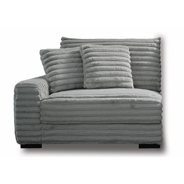 The Embrace Left Arm Facing Chair with 2 Accent Pillows in gray is a sophisticated and comfortable addition to your sectional arrangement. Featuring 100% gray polyester fabric with a fluffy, blanket-like texture, this chair promises ultimate relaxation. I