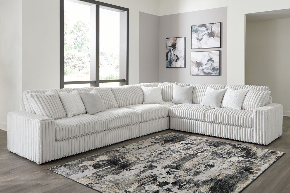 Donâ€™t want to sacrifice standout style for majorly cozy seating? This set pairs bold character with sink-in comfort. Its retro-cool jumbo cord over feather-blend cushions creates a luxuriously soft lounging experience. With this sectional and chaise, yo