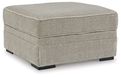 This ottoman with storage caters to your need for contemporary comfort. Itâ€™s decked out in feel-good fabric in a versatile hue. The family-friendly ottoman is ideal for hosts with the most, with easy-to-access storage space that keeps throw blankets on 