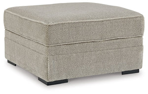 This ottoman with storage caters to your need for contemporary comfort. Itâ€™s decked out in feel-good fabric in a versatile hue. The family-friendly ottoman is ideal for hosts with the most, with easy-to-access storage space that keeps throw blankets on 