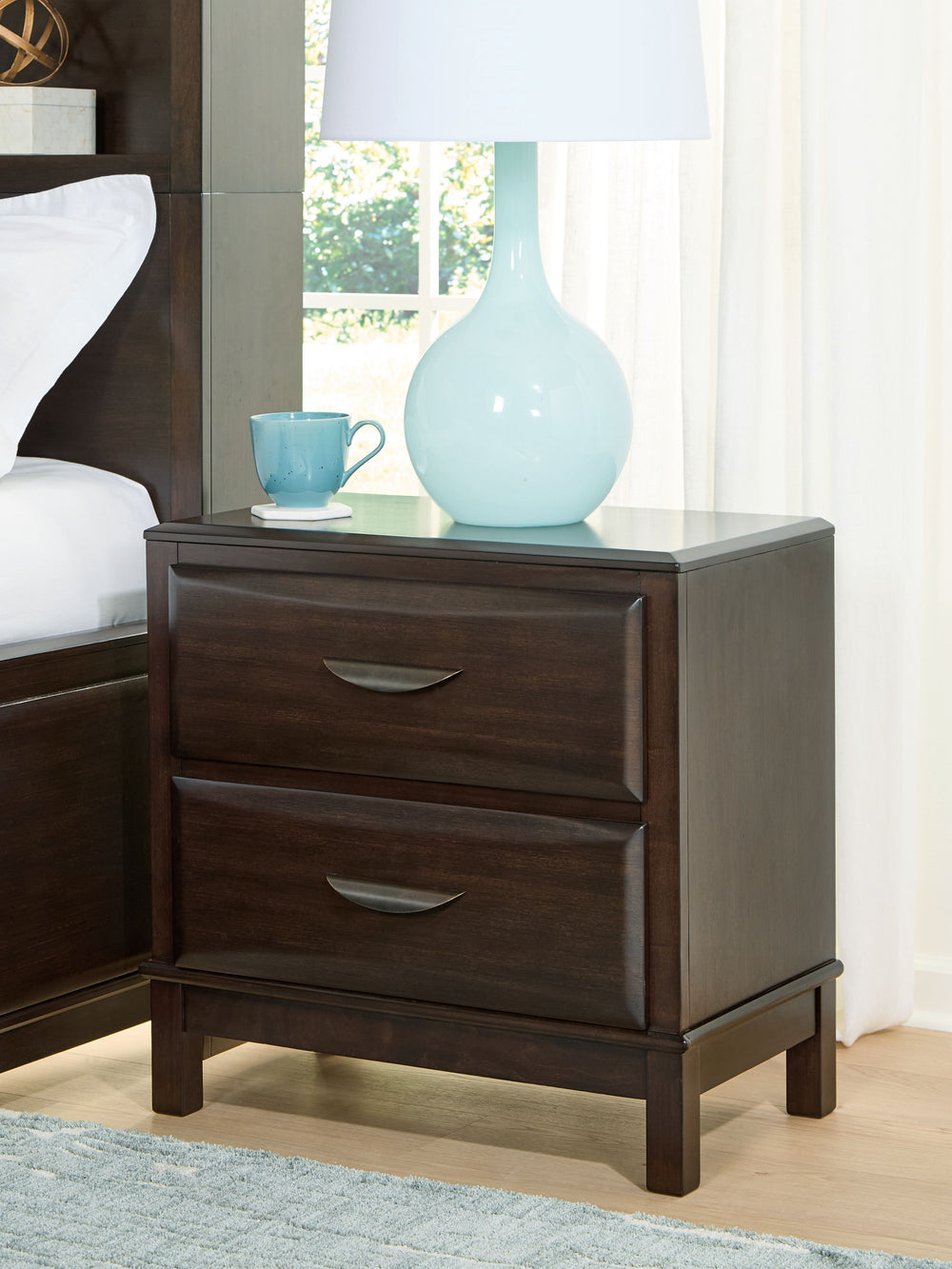 A rich, metropolitan finish. Unbeatable function. With this nightstand, itâ€™s a breeze to create a casual contemporary hideaway full of style and convenience. It combines thoughtful craftsmanship and handy storage, with smooth-gliding drawers to help kee