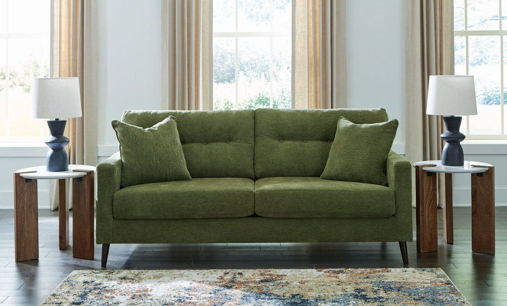 Feed your mid-century modern nostalgiaâ€”with a contemporary twist. A vibrant trend-right hue and comfy feel make this sofa perfect for lounging solo or with friends and family. Its linear profile adds plenty of fresh style, and the tapered accent legs ar