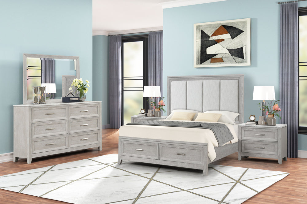 The Fiona 5 Piece Bedroom Set features a storage bed with a plush upholstered headboard, designed for ultimate comfort and convenience. The bed is complemented by a 6-drawer dresser and two 2-drawer nightstands, all exhibiting a harmonious blend of Acacia