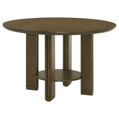 This transitional-style round dining table combines timeless design with practical functionality. Featuring a rich brown finish, it showcases a beautifully crafted tabletop supported by angular legs for a contemporary touch. An open lower shelf adds conve