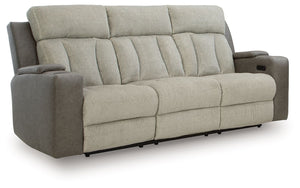 Refined relaxation, reimagined for the modern home. This power reclining sofa combines premium comfort with smart features like built-in storage arms, wireless charging and a drop-down table. One-touch reclining and adjustable headrests let you find your 
