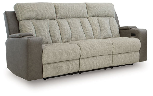Refined relaxation, reimagined for the modern home. This power reclining sofa combines premium comfort with smart features like built-in storage arms, wireless charging and a drop-down table. One-touch reclining and adjustable headrests let you find your 