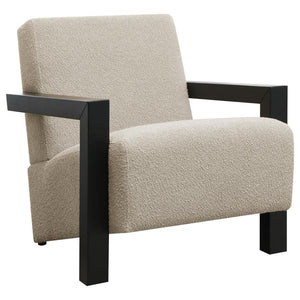 Exposed wood armrests add a sense of precision and structure to a modern accent armchair. It-'s a fresh, refined look with a neutral palette and minimalist allure. A slightly reclined seat and back create an inviting silhouette for the chair, which blends