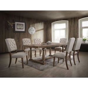  the rectangular table features a classic trestle base with turned legs and double molded edges all in a weathered oak finish. Matching dining chairs offer butt