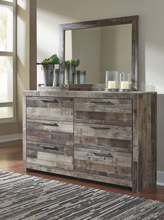 Modern yet hefty. This dresser and mirror set makes an urban eclectic statement. Seasoned raw wood look merges with the clean lined design we love today. Muted rustic finish over replicated pine grain maintains its authenticity. Roomy drawers are flanked 