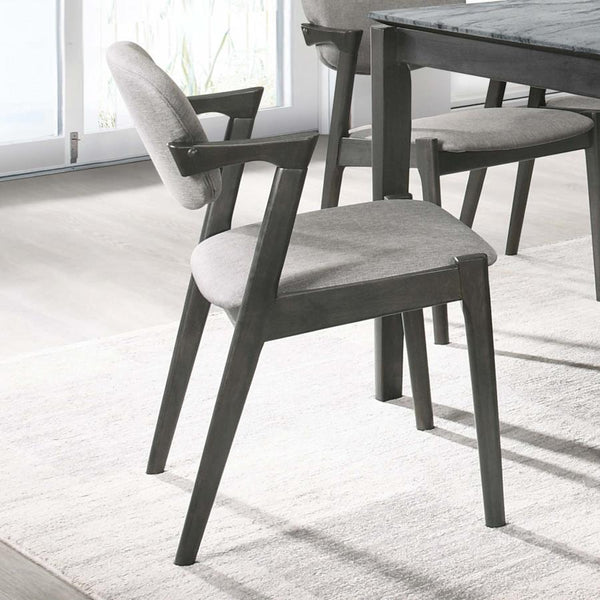  designed to bring clean lines and dramatic angles into your home. Upholstered in a richly toned fabric