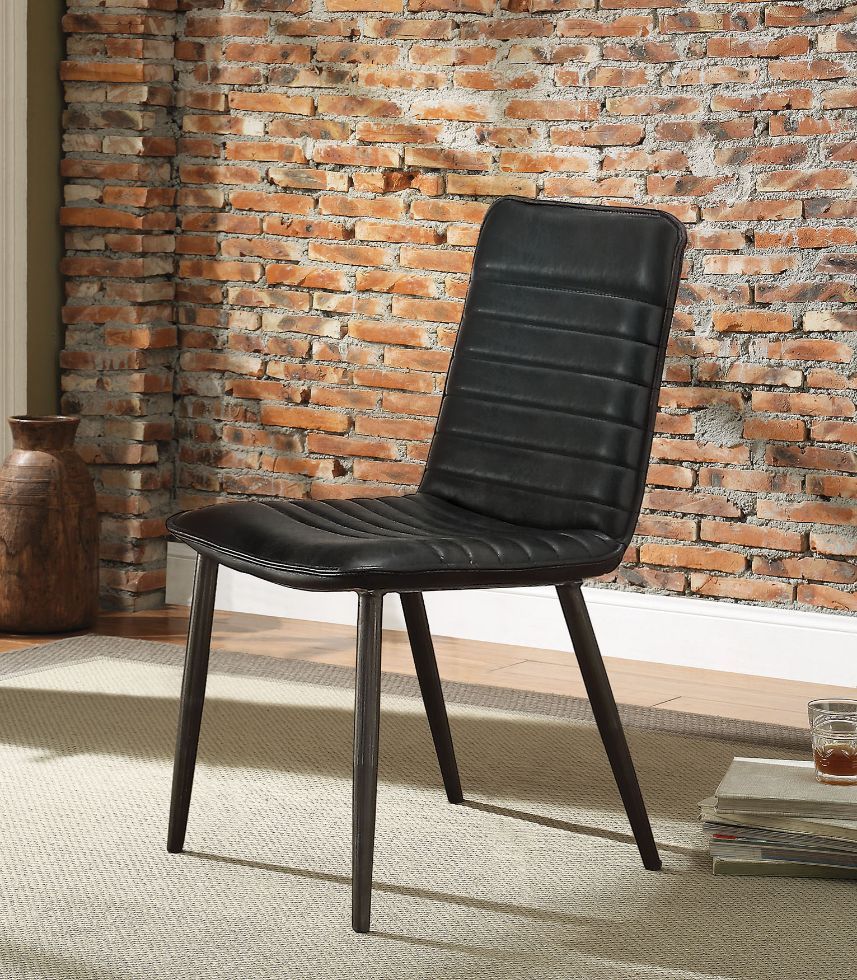 The Hosmer side chair bring a clean and modern style to your dining room. This dining chair features a black top grain leather padded seat with metal tapered legs in an antique black finish, creating a retro vibe. Add this chair to any table for extra com