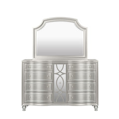 Meet the Reflection Mirror in Silver, expertly crafted from solid Pine and high-quality manufactured wood for enduring strength and durability. Its glamorous matte silver finish adds an elegant frame to the dresser mirror, enhancing any bedroom decor with