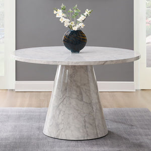 The Kacey dining set, with its elegant round wooden table top, exudes charm and sophistication. The marble grain finish adds a touch of luxury, while the single pedestal base ensures stability. Complemented by padded seat and back cushion side chairs, thi