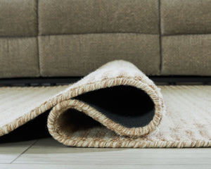  creates a subtly eye-catching look that brings modern elegance to any casual space. Crafted from wool with a ge