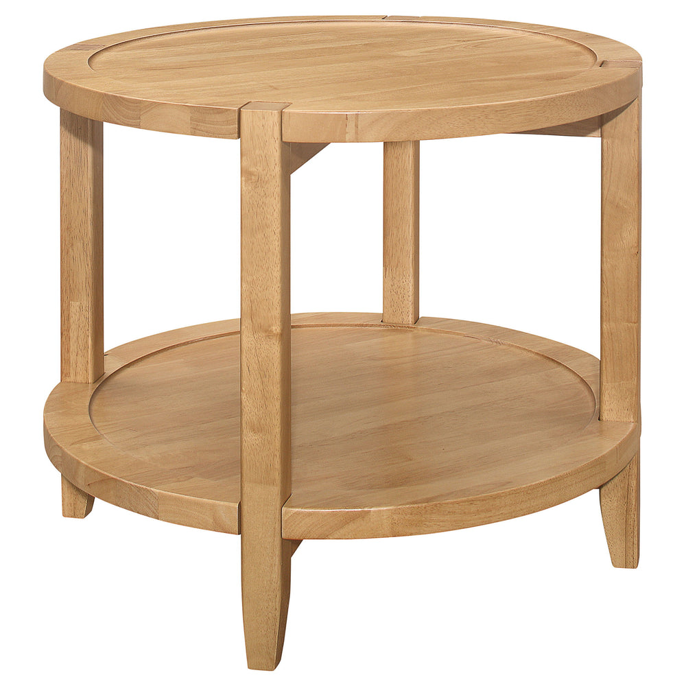 Encourage a warm, welcoming ambiance with the choice of a modern farmhouse end table. Its round profile is crisp and familiar, while offering movement and flowing energy. The table is crafted in Asian hardwood for optimal quality and received a warm maple